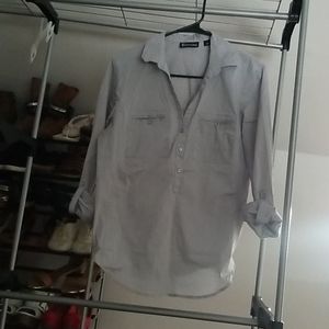 3/4 button up. Cuffed sleeved